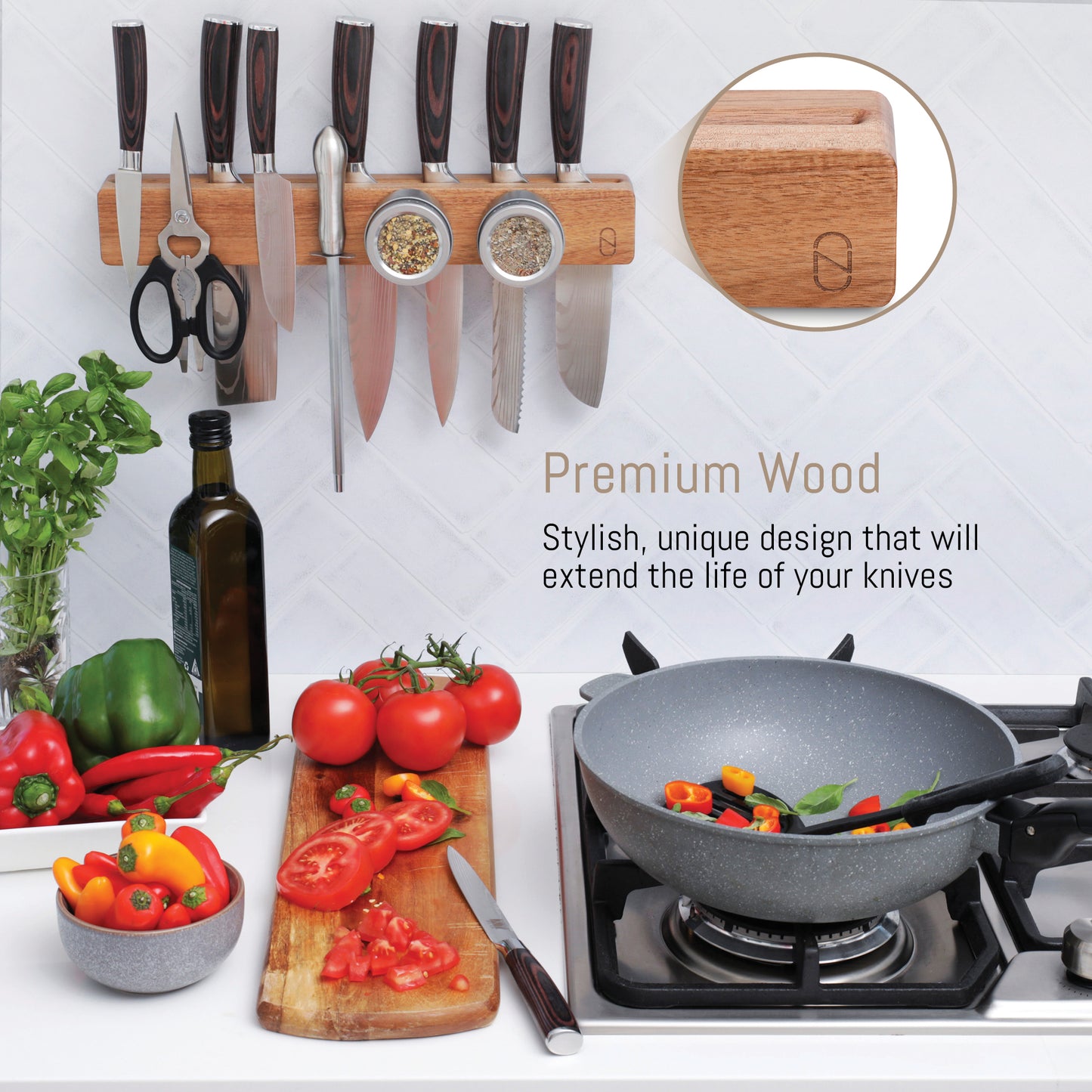 Wooden knife holder with knives, scissors, and spices on a kitchen counter with vegetables and a pan.