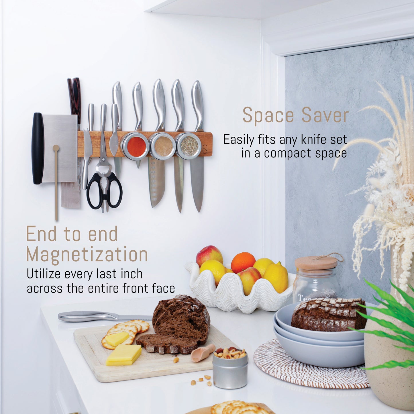 Knife holder with magnetic knife set on a kitchen counter with food items.
